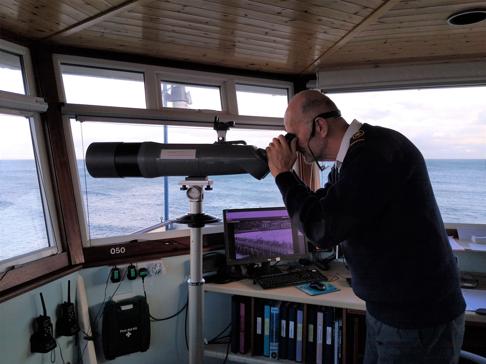 A watchkeeper looks out to sea. PHOTO: NCI