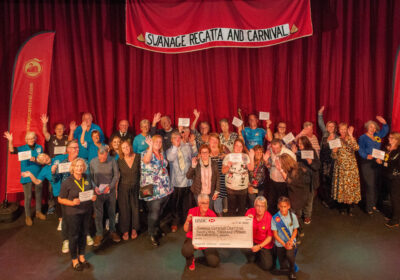 Representatives from groups receiving their cheques on the night PHOTO: Murray Lambert