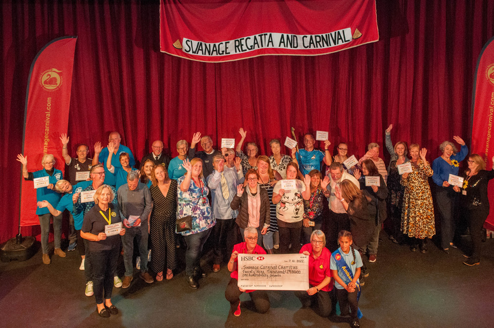 Representatives from groups receiving their cheques on the night PHOTO: Murray Lambert