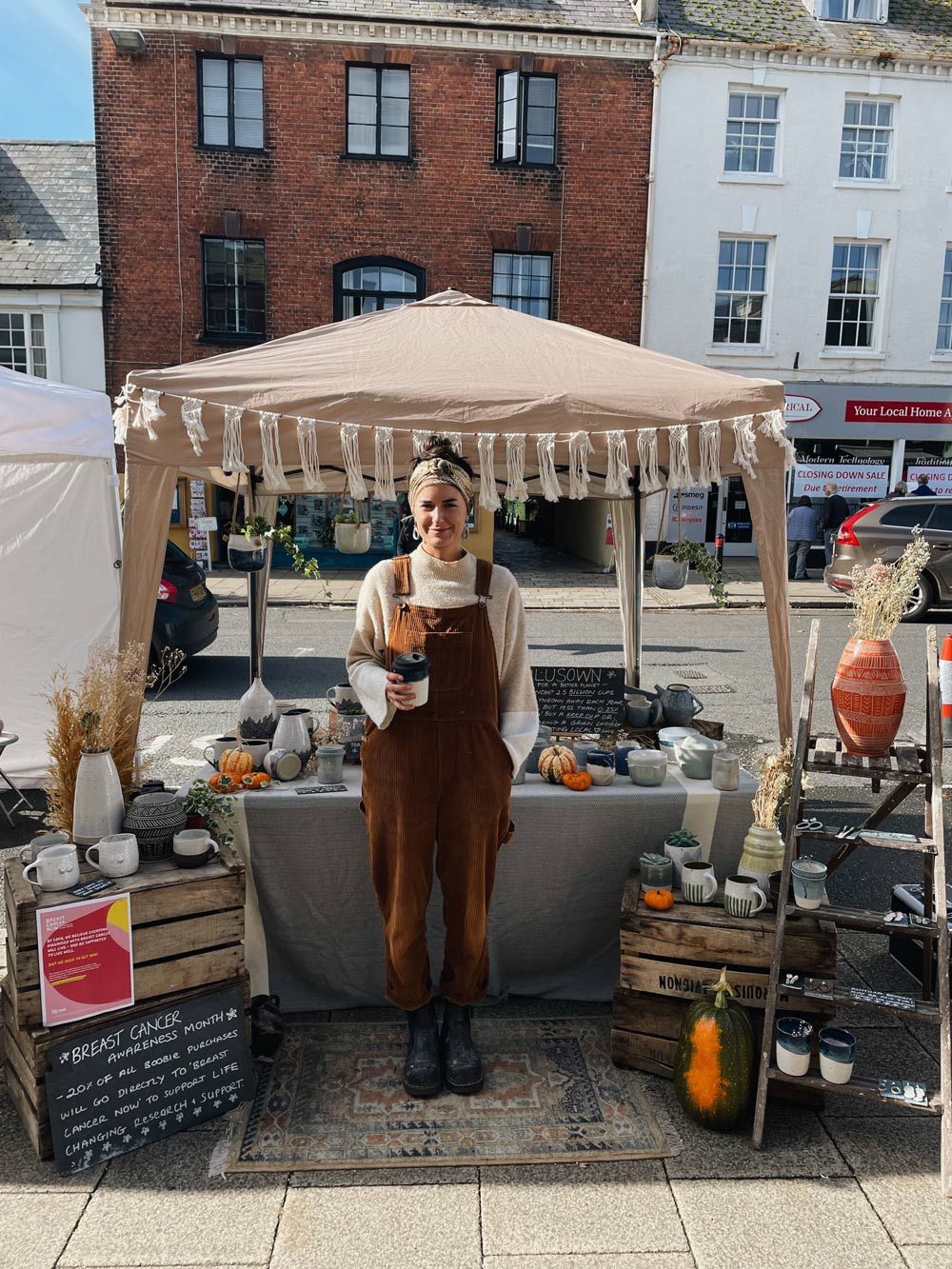 Ceramicist Lucy Burns, 24, hard at work at Bridport Market