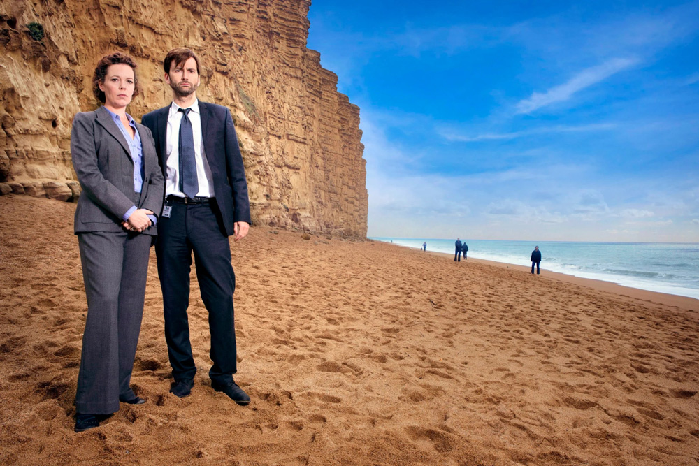 Olivia Coleman and David Tennant on the beach. Photo: ITV