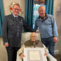 Gordon with, left, driver John Reid in his RAF uniform and right, son, Alan