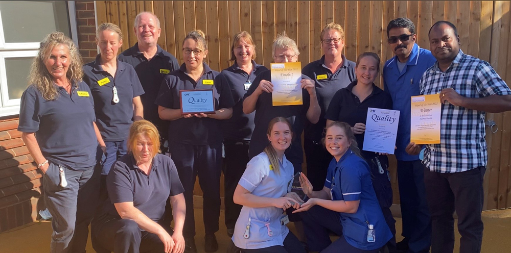 The St Brelades Ward team celebrate their award