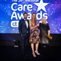 Lorna Parsons (centre) receives her Chef of the Year award from ITV presenter Matt Johnson and Jo Wildman, director of compliance, governance and quality Caring Homes