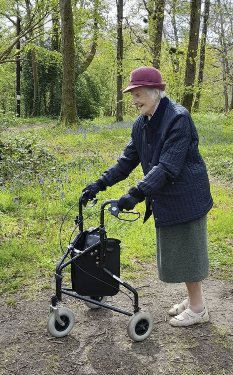 Barbara Rawlin 108, who lives in Wimborne, walking at Pamphill