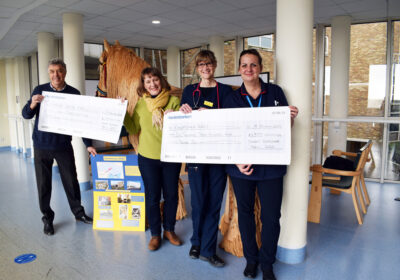 Phil Wylie and Hazel Hoskin with staff from Kingfisher children’s ward at Dorset County Hospital