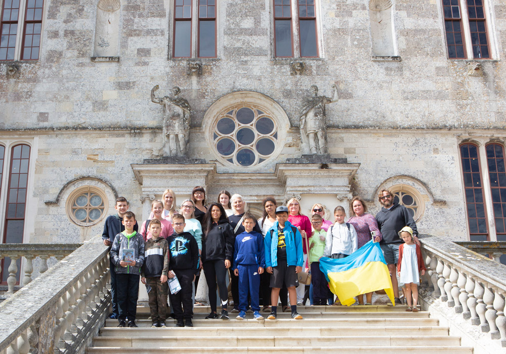 Ukranian refugees during a visit to Lulworth Castle