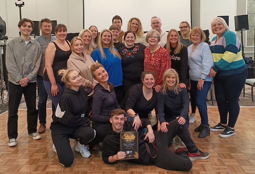 The contestants with their professional dance partners