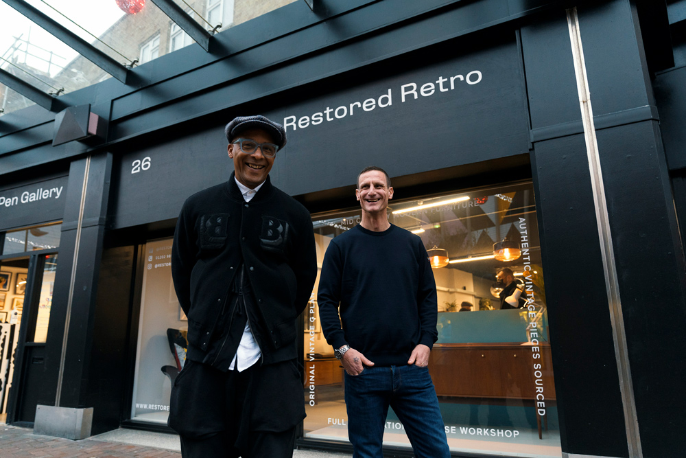 TV presenter and furniture restorer Jay Blades with Steve Wyatt of Restored Retro in Poole. Credit: Mikey Steven