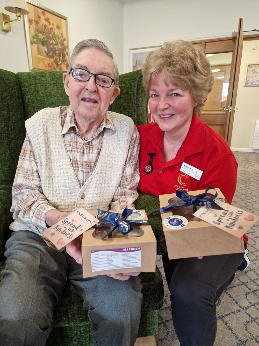 With shortbread gifts at Kingfishers in New Milton are resident Terry Vass and Companionship Team member Christina Holliday
