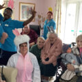 Team members and residents at Care South’s Dorset House bought toys for children who attend Muddy Boots Nursery School.
