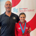 Swanage youngster Daisy Kirkpatrick with coach Luke Dormer