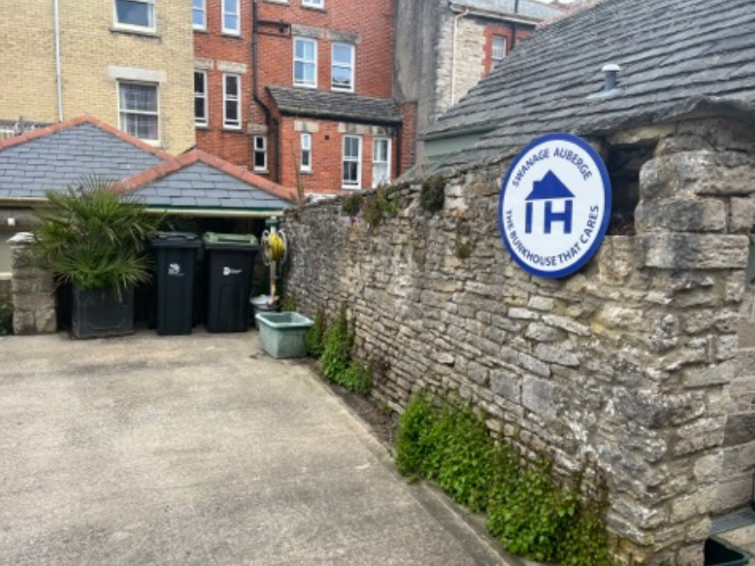 The hostel is at the rear of the property in Swanage High Street