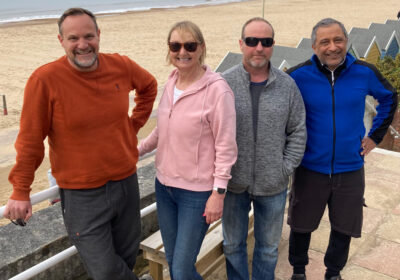 The team (from left) Anthony Walton, Cathy Lewis, Mark Bauer and Neil Ingle and (below) swimming in Swanage Bay