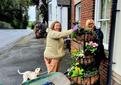 GREEN-FINGERED gardeners in Wareham are going for gold this summer in Britain in Bloom competitions.