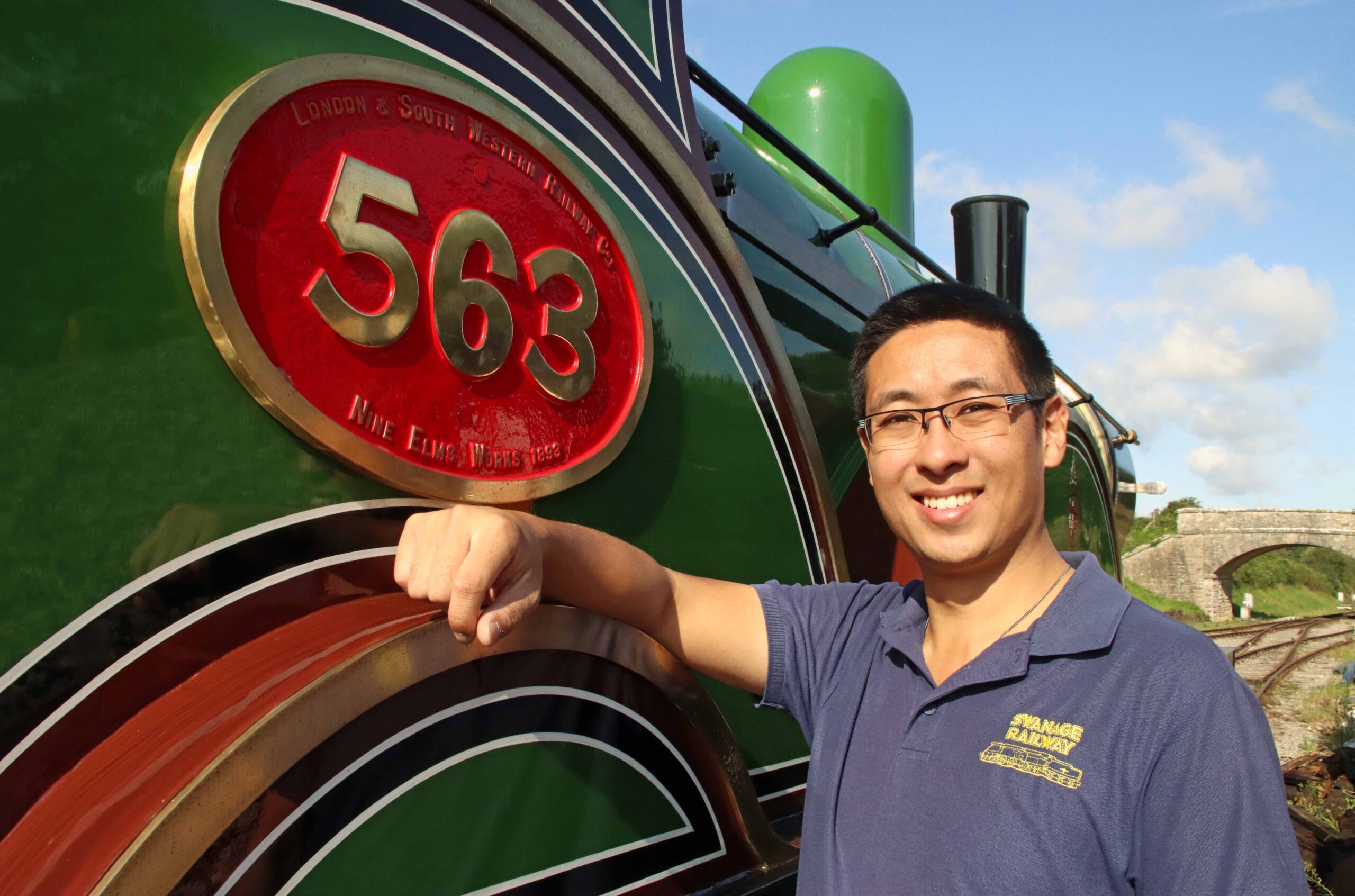 Nathan Au with the locomotive. Picture: Andrew PM Wright
