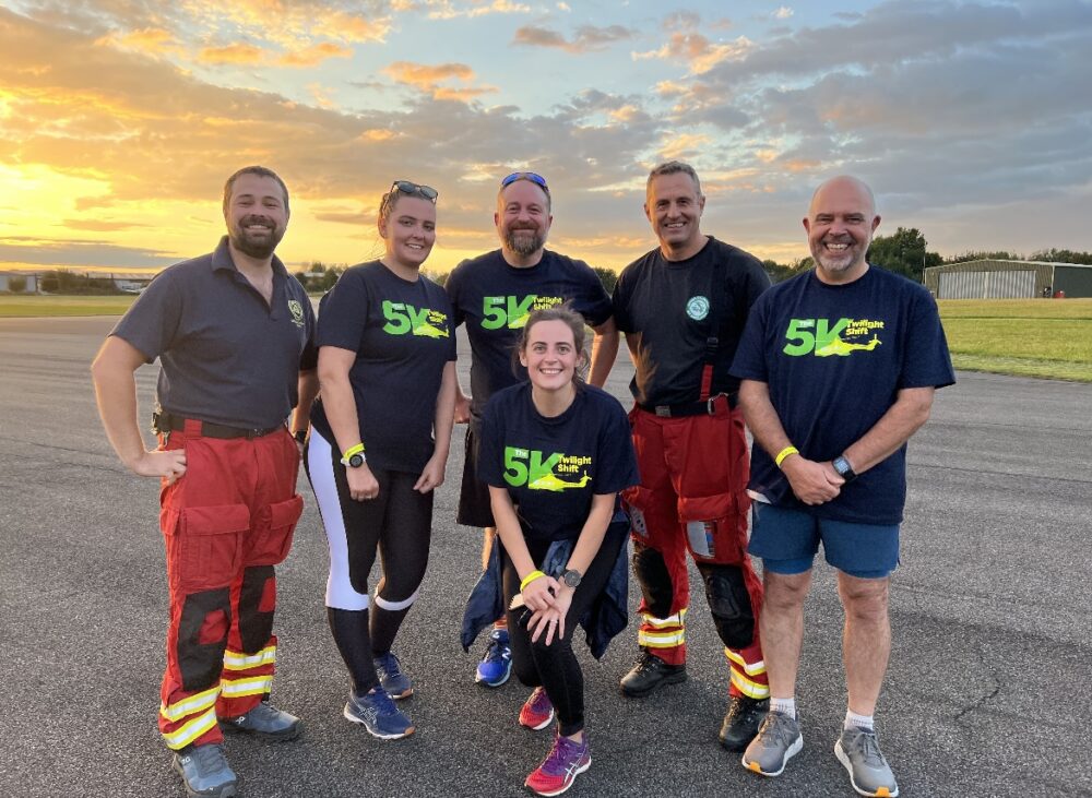 Air ambulance crew members with participants at last year's 5K Twilight Shift