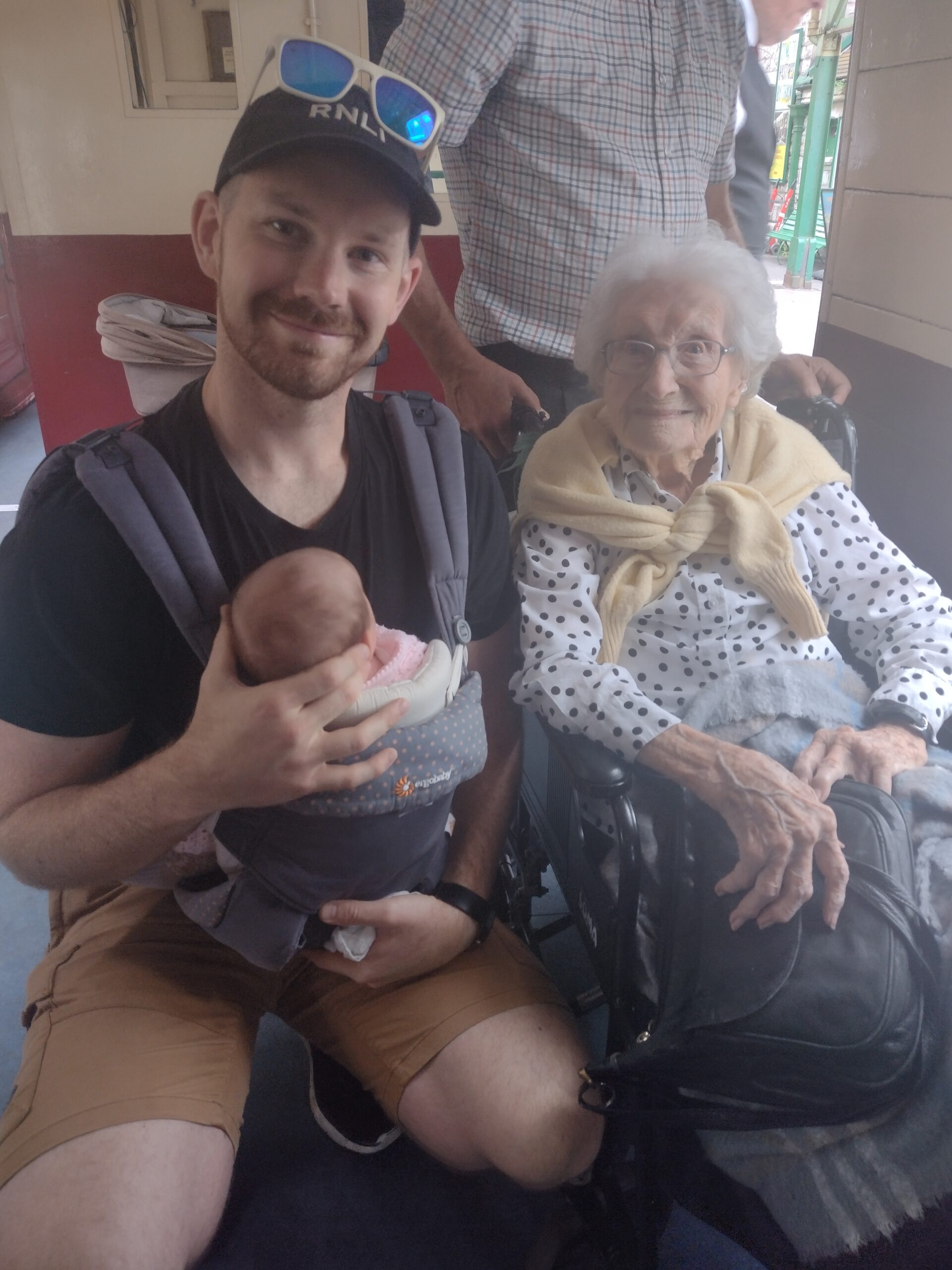 Yvonne with fellow passenger Nick and his daughter, six-week-old Effe