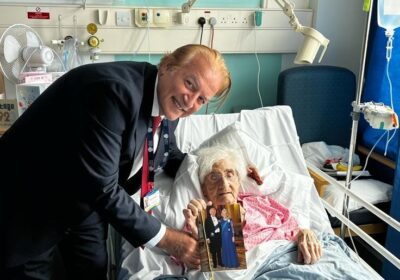 Agnes with birthday card from King Charles and hospital consultant Mr Bassam Zwan