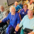 Kate Adie with Alexandra House residents in Poole