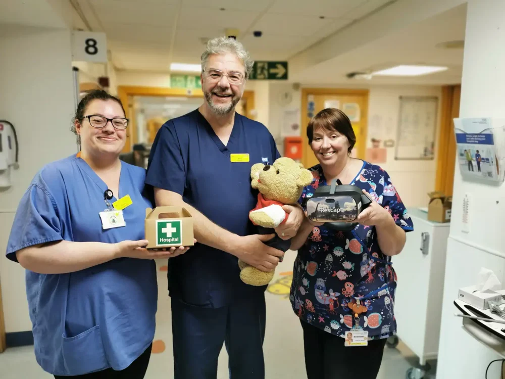 Allysha Pell, trainee play specialist (left) and Debbie Daniels, play specialist, with children's unit staff nurse Kev O'Brien, are keen to meet as many children – and their soft toys - as possible at the teddy bear clinics