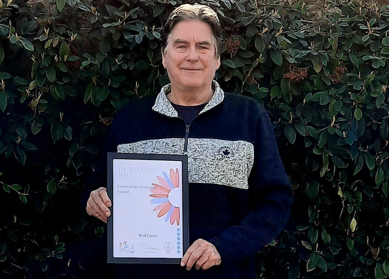 Chairman Rod Curtis with his Community Champion certificate