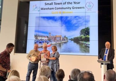 Committee members Sue and Bob Dean accept the awards at RHS Wisley