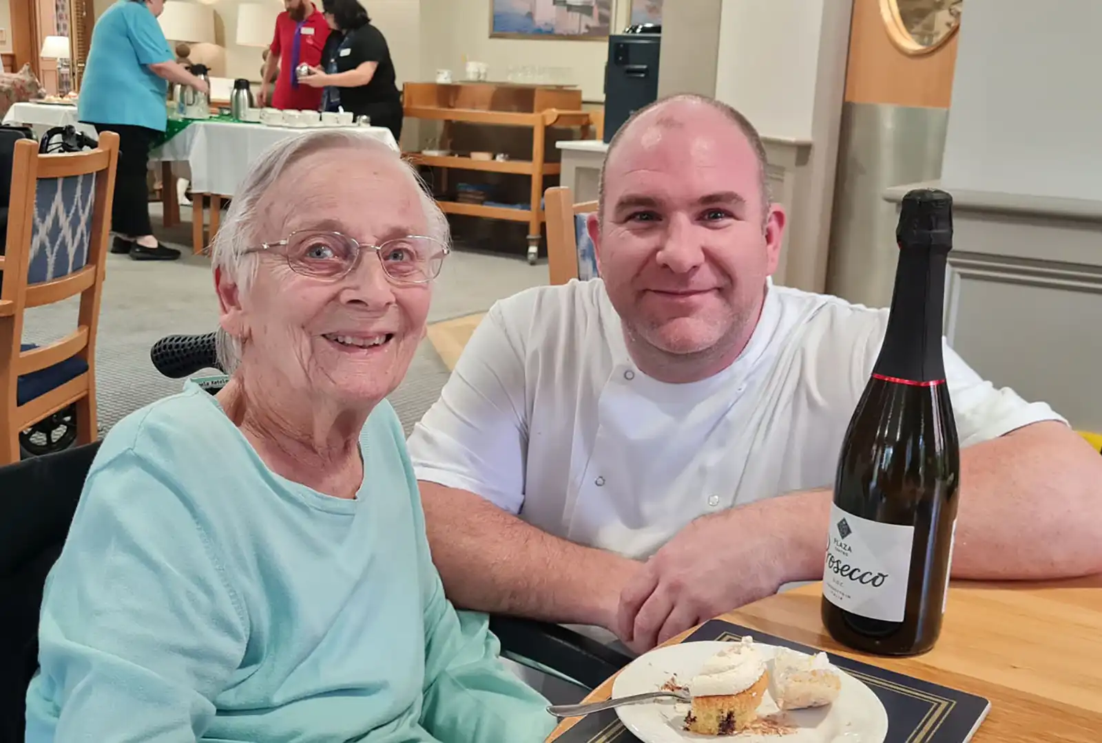 Resident Pamela Kately won the Golden Cupcake prize at Canford Chase in Poole. With her is Chef Mark Hubbard