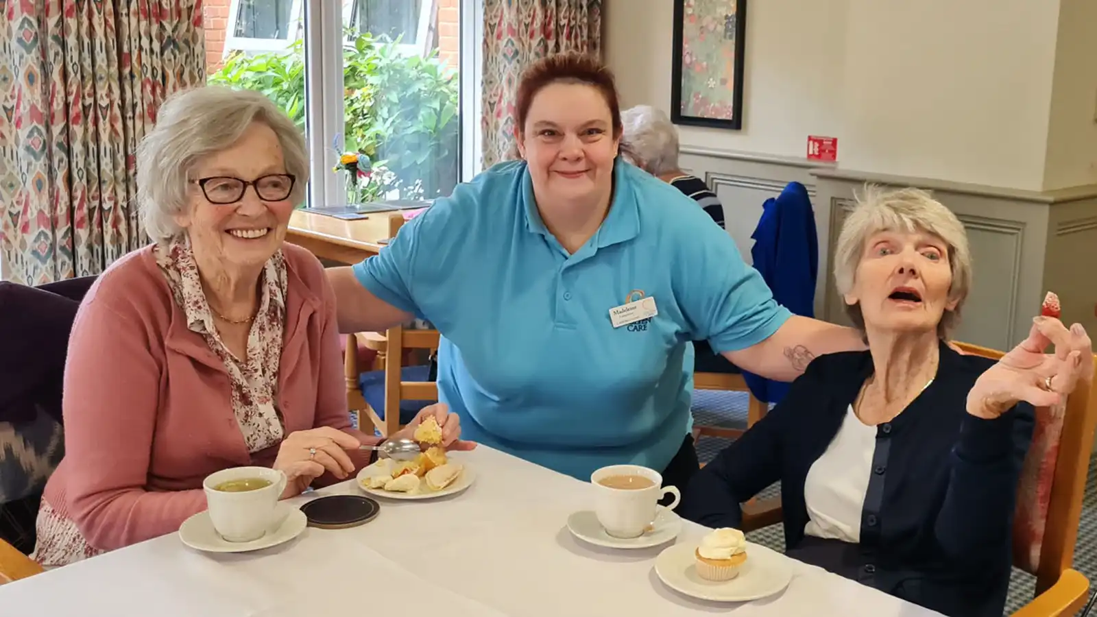 At Canford Chase for the Macmillan Coffee Morning are, from left: resident Janet Wolstenholme, Colten Companion Madeleine Baker and resident Betty Aitchison