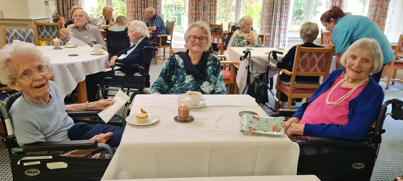 Enjoying the Macmillan Coffee Morning at Canford Chase in Poole are residents, from left, Yvette Bone, Anne Hammond and Barbara Rivett