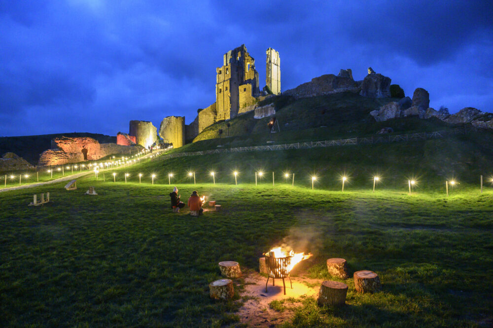 Corfe Castle illuminated by christmas lights. Photo: Jon Bish.