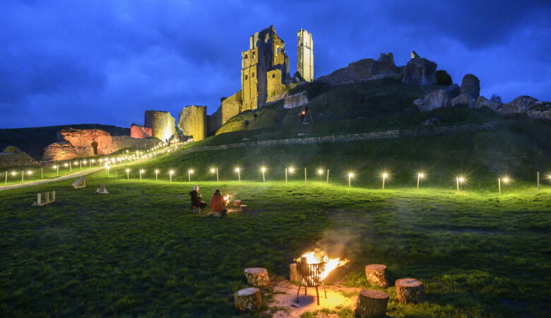 Corfe Castle illuminated by christmas lights. Photo: Jon Bish.