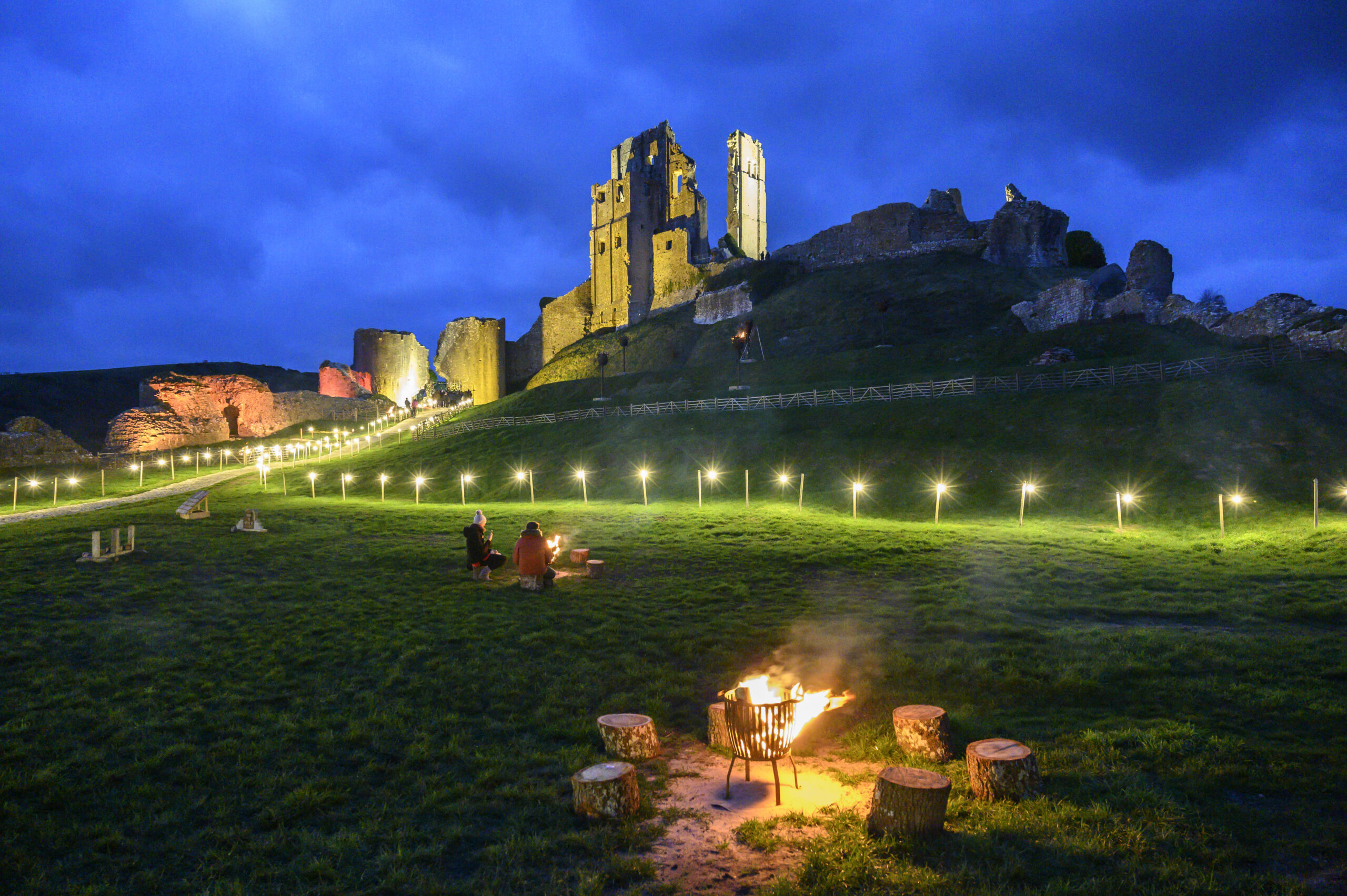 Corfe Castle illuminated by christmas lights. Photo: Jon Bish.