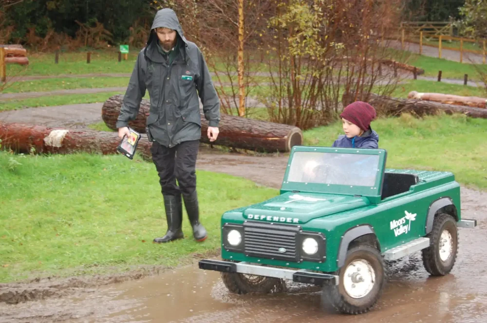 Youngsters can get behind the wheel of mini Land Rovers at Moors Valley. Picture: Dorset Council