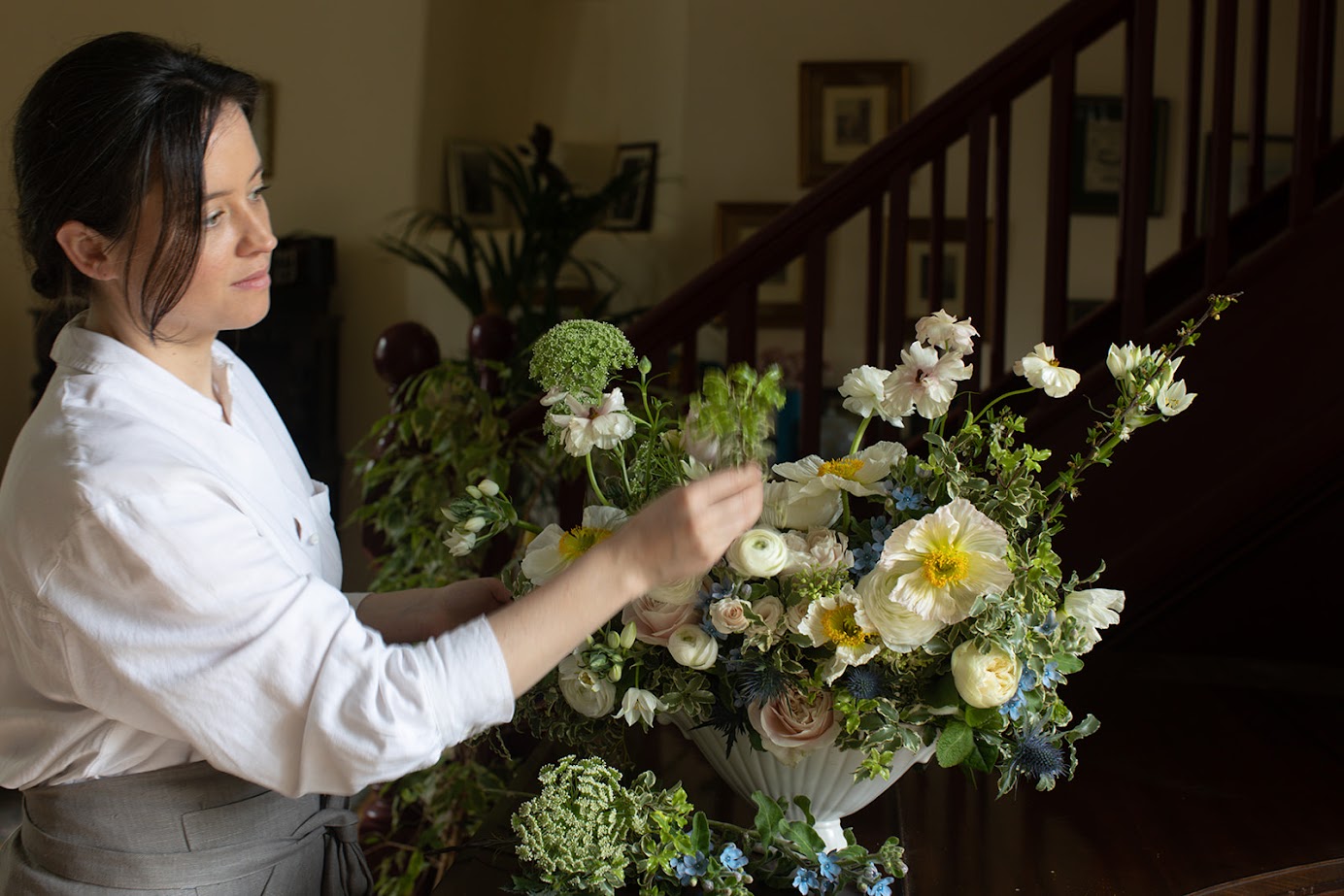 Selina Kerley setting a floral display. Photo: Selina Kerley.