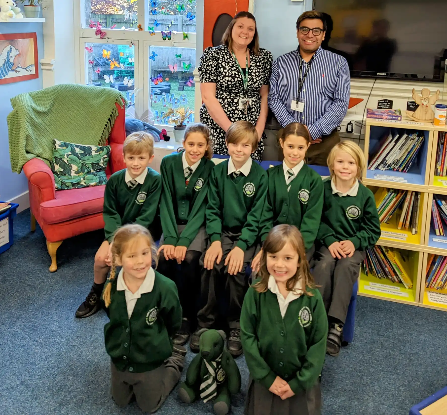 Corfe Castle Primary School headteacher Amy Howe, back left, with deputy Robert Stoner and pupils