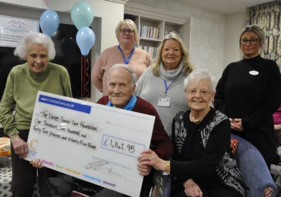 Holding the cheque, from left, Bourne View residents Joan Blackshaw, John Broomfield and Irene Whyment. Behind them are, from left, DCCF fundraising manager Jannine Loveys and trustee Di Bird; and Bourne View home manager Gemma Parkin