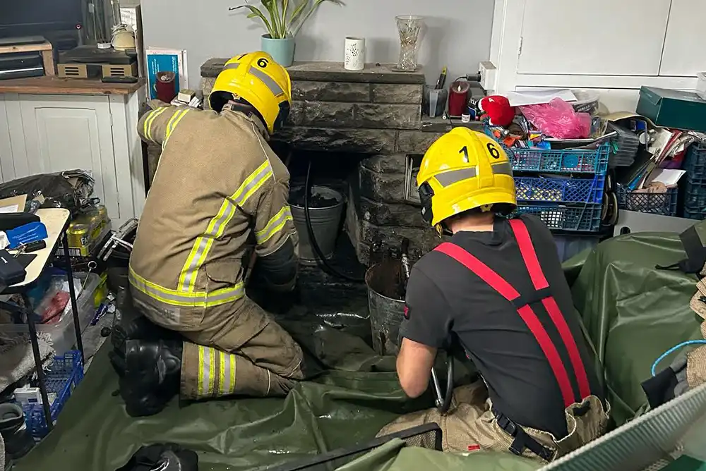 Crews from Swanage and Wimborne dealt with the chimney fire in Langton Matravers. Picture: Swanage Fire Station