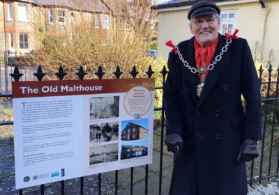Mayor of Dorchester, Cllr Alistair Chisholm, with one of the new information boards