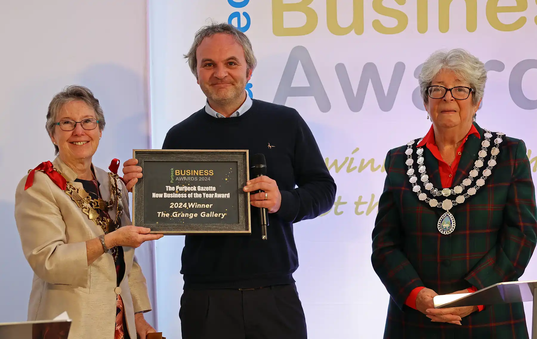 Purbeck Gazette editor Paul Jones with Wareham Mayor, Cllr Carol Turner, and Mayor of Swanage, Cllr Tina Foster