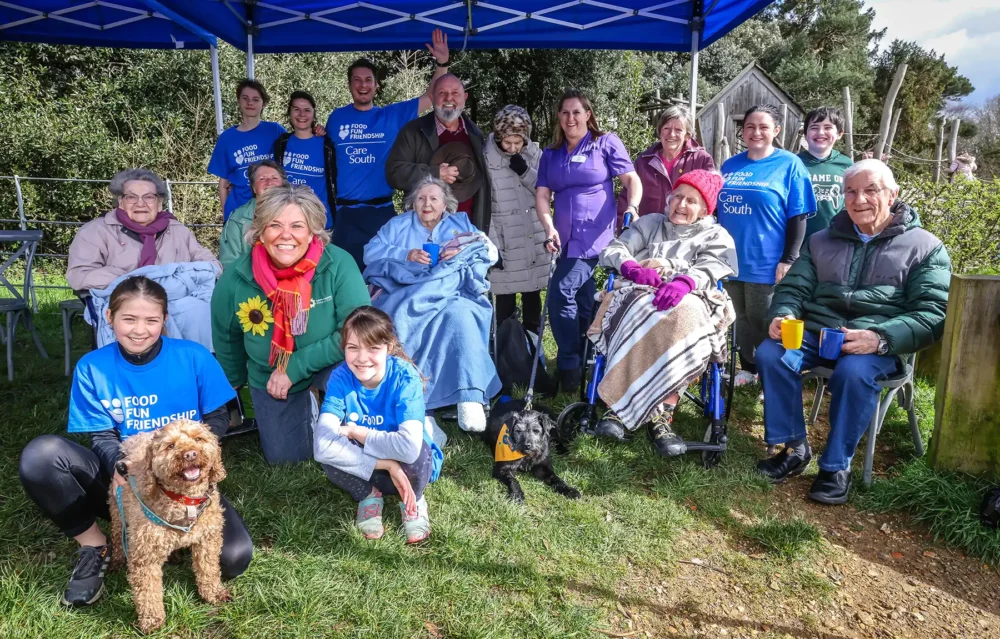 Care South staff and residents with the Lewis-Manning Hospice Care team at the Muddy Dog Dash