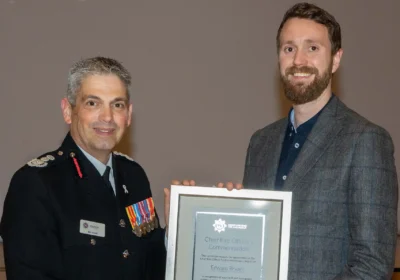 Edward Bryant, of Wimborne, received his award from CFO Ben Ansell. Picture: DWFRS