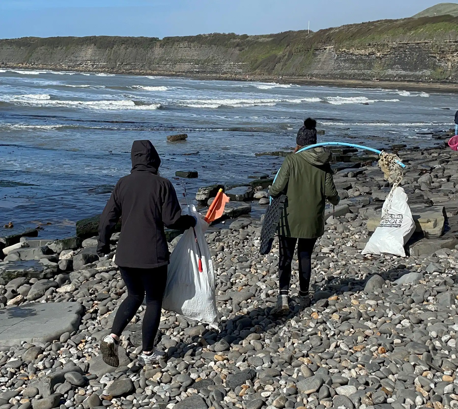 Hunting litter in beautiful surroundings during the Great Dorset Beach Clean