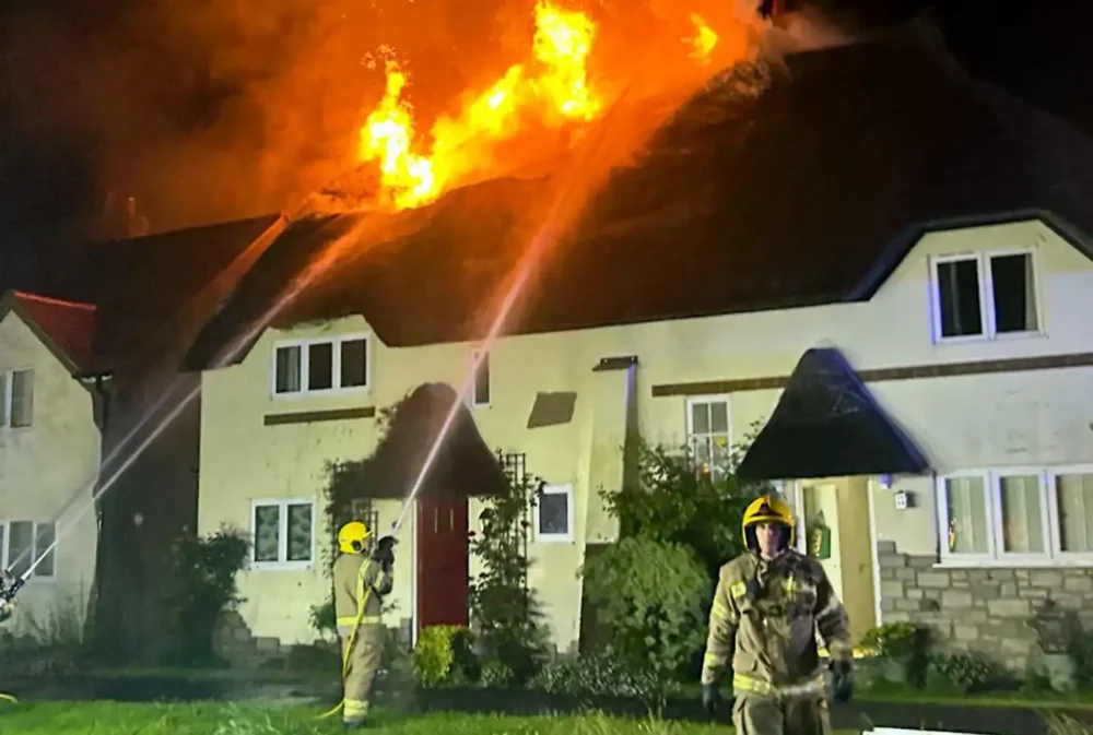 Firefighters tackling the blaze in Stoborough Meadow, Wareham. Picture: Swanage Fire Station