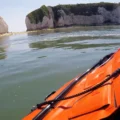 The crew scrambled to rescue the teen after he fell from the Old Harry Rocks. Pictures: RNLI