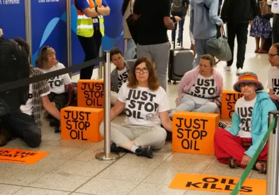 Mel Carrington, from Christchurch, (front centre) is believed to have been arrested at Gatwick. Picture: Just Stop Oil