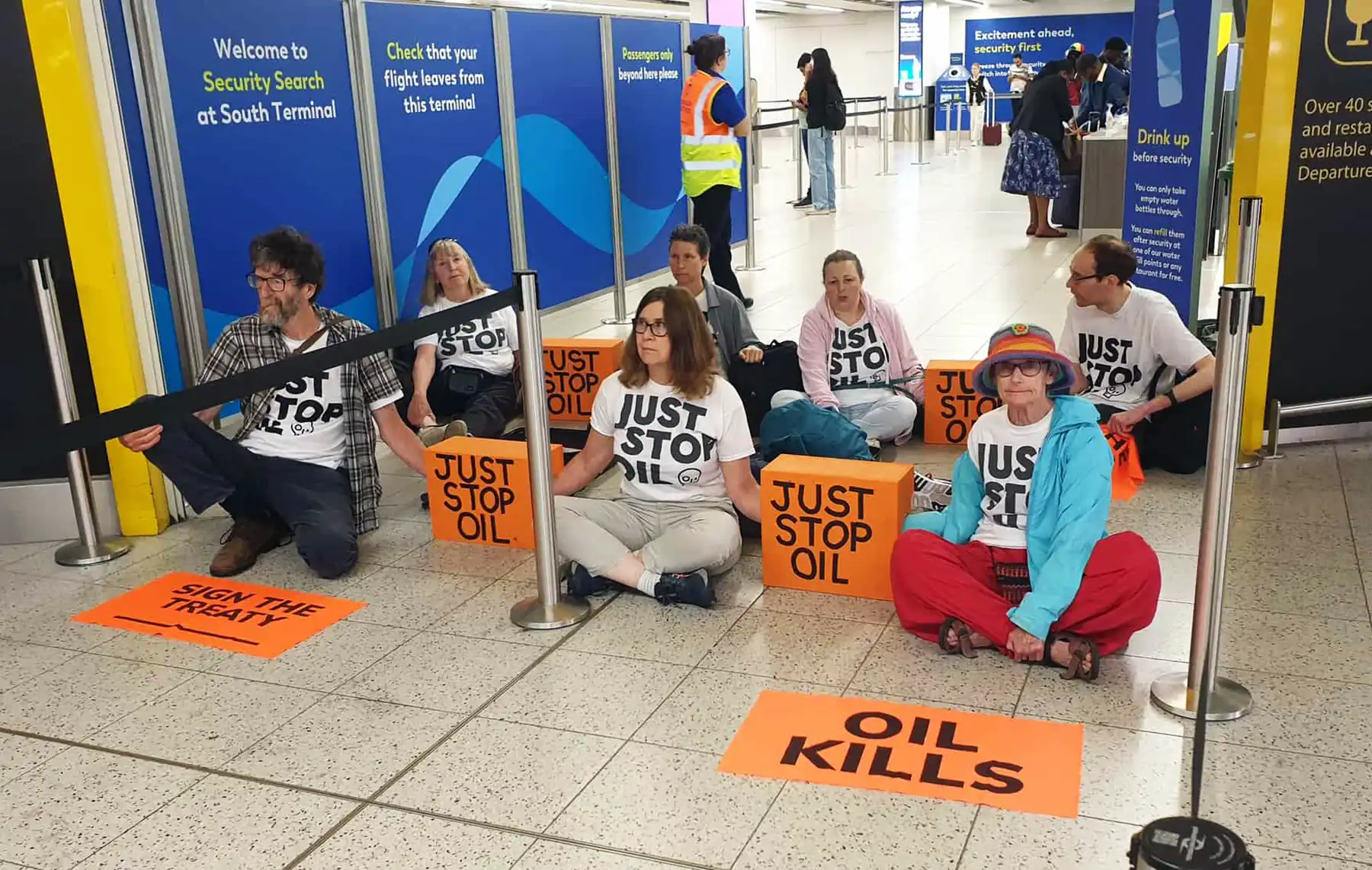 The group blocked a gate at Gatwick Airport. Picture: Just Stop Oil