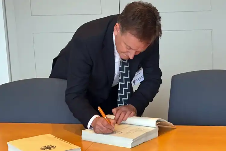 Steve Gladston, CEO and founder of HeliOperations, signing the contract. Picture: HeliOps