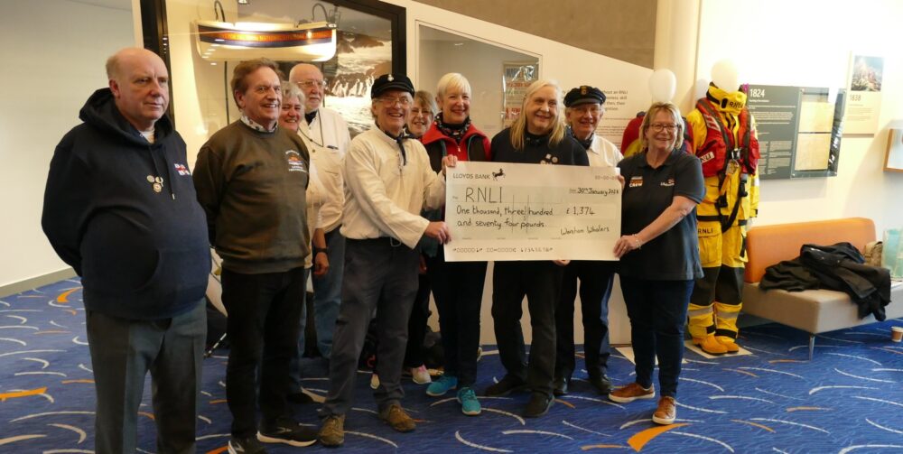 Wareham Whalers presenting the final cheque for £1,374 to representatives of RNLI fundraising groups from Poole, Mudeford, Wareham and Weymouth Picture: Wareham Whalers