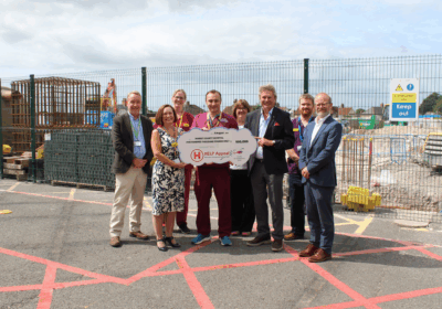 Robert Bertram, Chief Executive of the HELP Appeal, presents the final £500,000 instalment of their £2million donation to Dorset County Hospital staff Picture: DCH